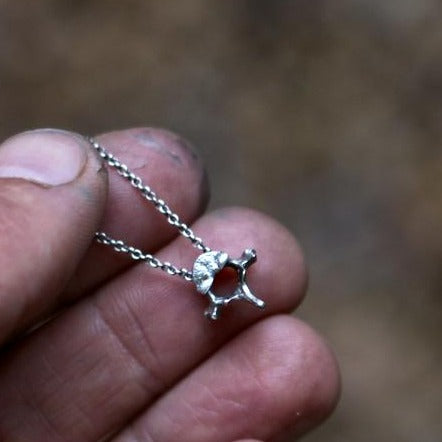 Undaunted and Industrious - Tiny Sterling Vertebra Charm Necklace