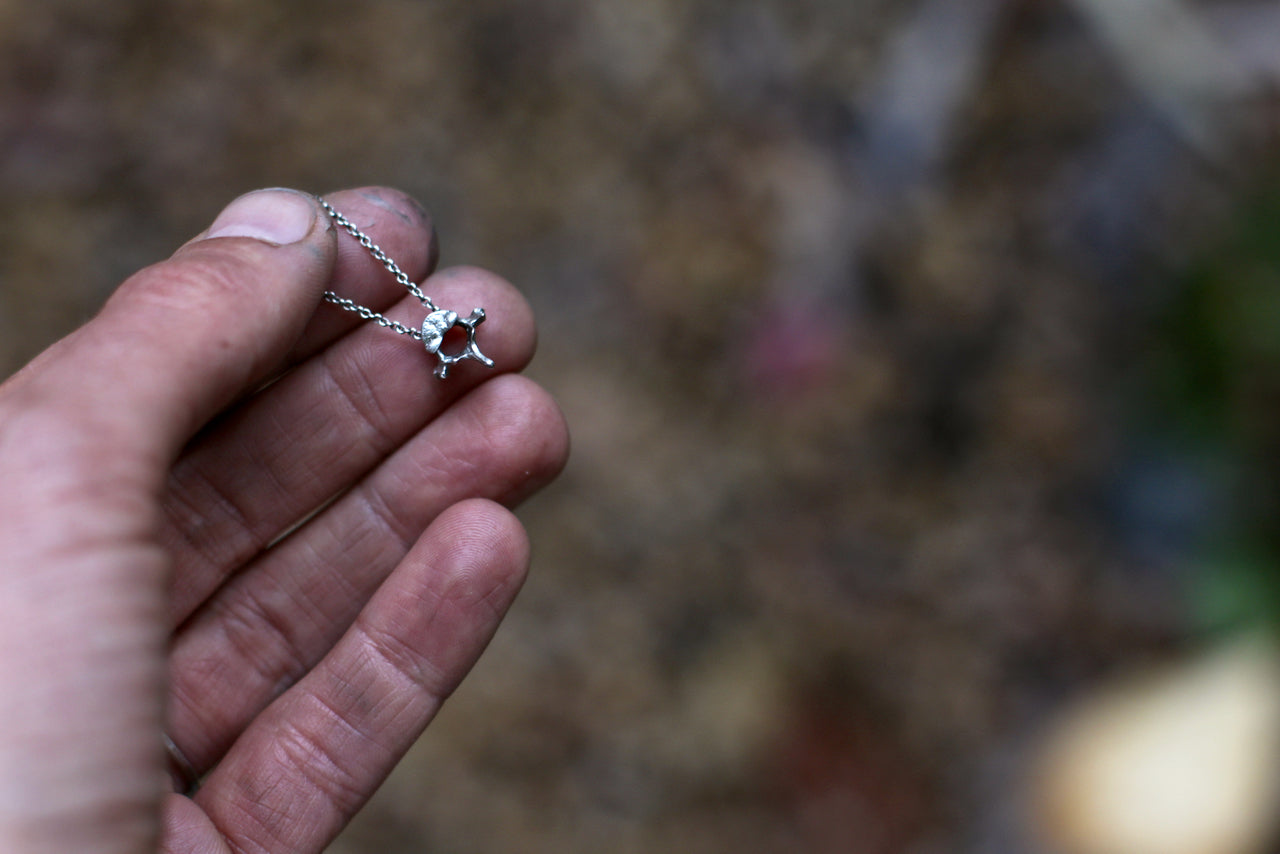 Undaunted and Industrious - Tiny Sterling Vertebra Charm Necklace